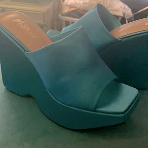 Teal color wedge sandal comfortable said